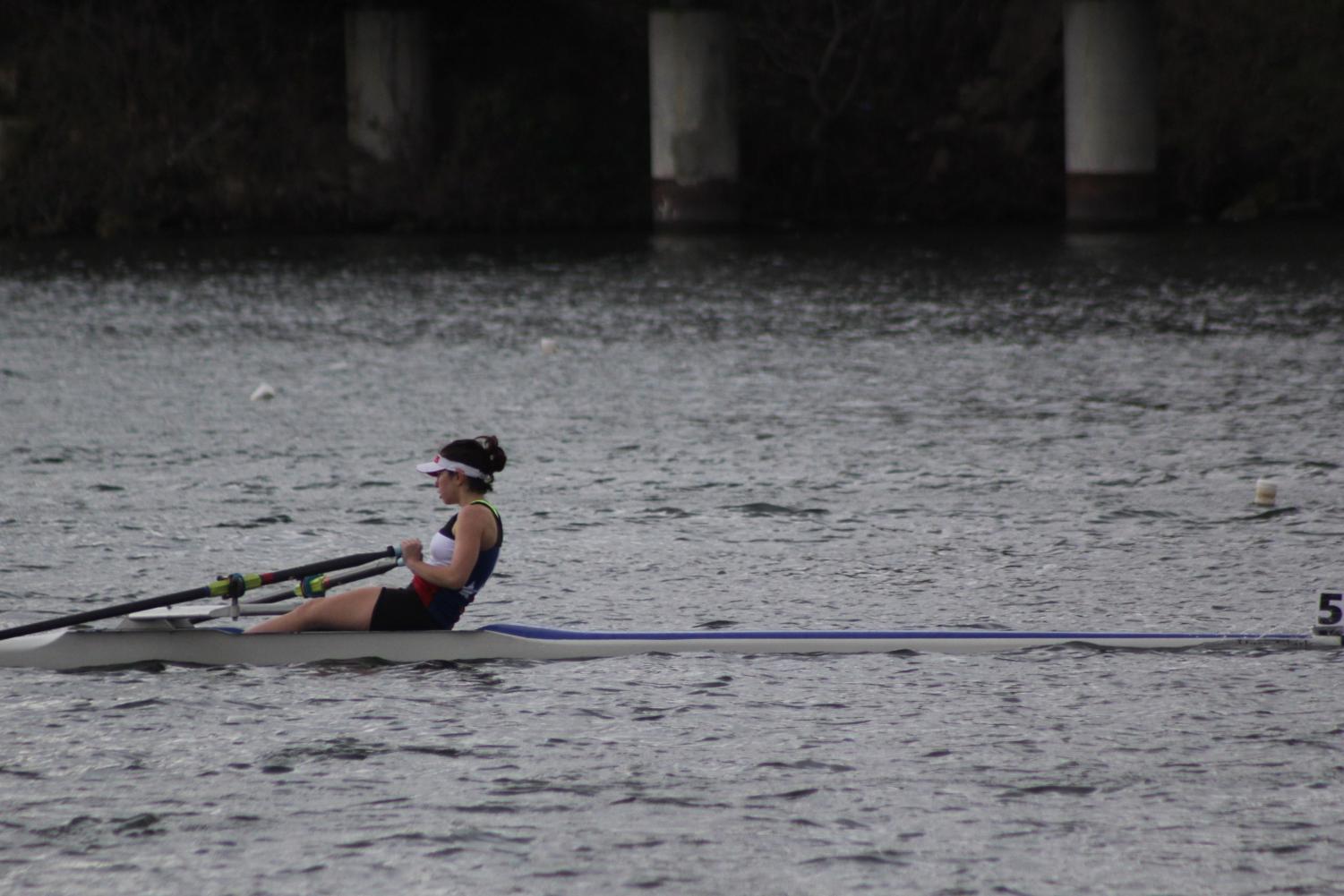 Dorothy Childs of the Texas Rowing Center rows on Lady Bird Lake on March 4. Rowing is one of several off-campus sports that is eligible for off-campus PE credit through AISD. Photo by Sarah Slaten.