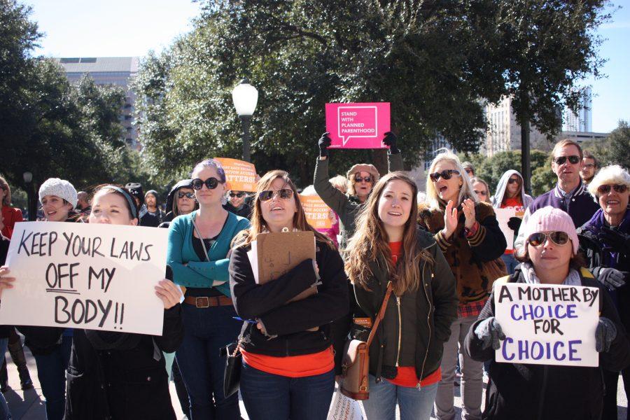 Diana Silva (bottom right) attended the pro-choice rally commemorating the 43rd anniversary of the Roe v. Wade Supreme Court decision at Texas on Jan. 22. Sex ed should be provided for everyone, Silva said. Its not just about posting on Facebook or social media, its about doing something about it. Photo by Ashley Chamberlain.