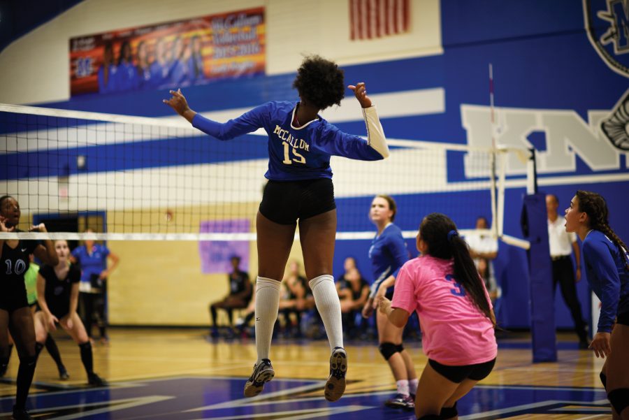 Senior Britny Clayton-Mitchell scores the winning point in the first set of a home match against arch-rival Anne Richards on Oct. 6. The Knights beat the Stars, 3-0, for the first time since 2013. Photo by Maya Coplin.