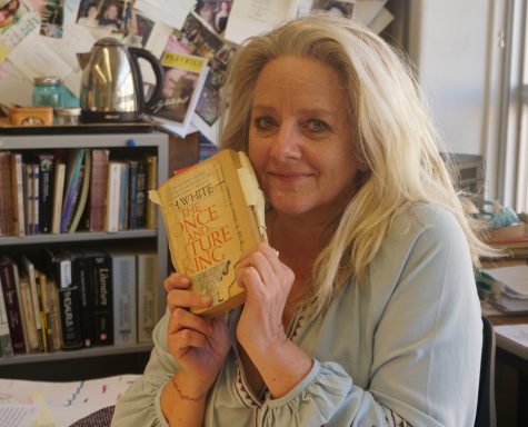 Mrs. Adamson holds her copy of her favorite book. Photo by Madison olsen