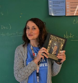 Ms. Northcutt holds her copy of Frankenstein. Photo by Madison Olsen