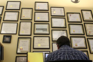As he continues to work in sketch up I strike up a conversation about all the framed papers on the wall. Many of them are simple things like bachelors and master’s degrees while most are awards for various projects over the years. The only reason he sits with them in front of him is that it was the only wall big enough to hold them all. “I would never take credit for an award but I would like to think I was influential in some.”