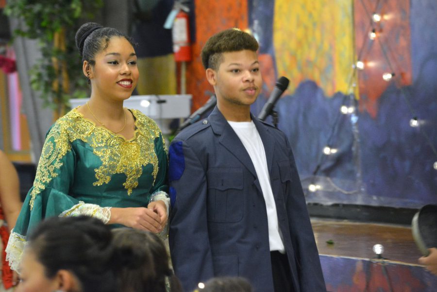To open the show, ___ and Freshman Terrell Hall tour the cafeteria, greeting children and parents as Tiana and Naveen from Disneys The Princess and The Frog. dbkaejbfke Terrell said bnaskjfvs