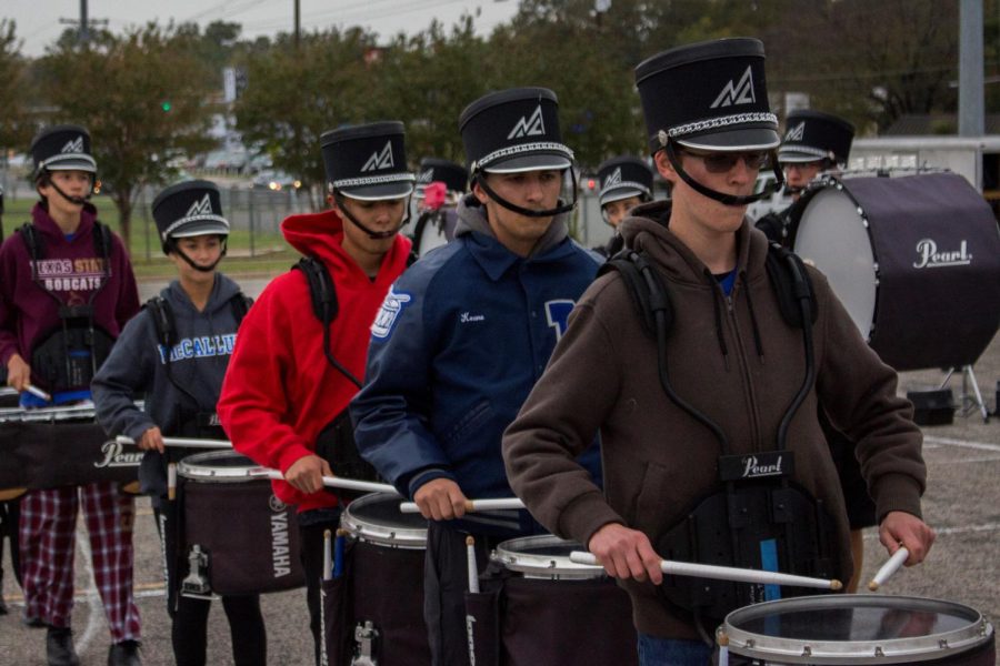 Follow Mac band through their day at a state competition