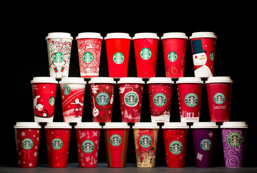 The cup designs starting from 1997 [bottom row right side] to 2017 [top row left side]. The different designs changes can be noticed as the designs decrease the amount of Christmas spirit included. Photo from Starbucks Newsroom. Reprinted with permission.