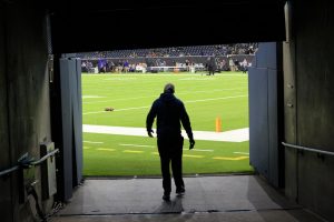 Taylor walks out on to the field at NRG Stadium where the Knights played in the 5A Divsion 2 semifinals. Photo by Madison Olsen.