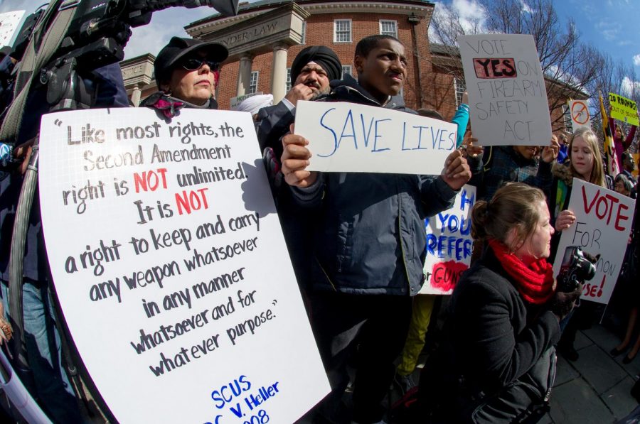 Gun control advocates brandish signs lamenting gun violence at the Prevent Gun Violence Rally on Lawyer's Mall in front of the State House in Annapolis, Md. on March 1, 2013. Almost five years later, the fight for gun control is no less urgent. Photo by Jay Baker. Accessed through Flickr Creative Commons. Reposted with permission and without modification.