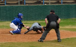In his first MAC Alumni Game, freshman catcher made a big impact, applying this tag to thwart a double steal and then stroking a two-out RBI single to tie the score at 4. Photo by Dave Winter.