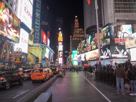 The major tourist destination Times Square sits at Broadway and 7th avenue. The area is brightly lit even at night with the large screens showing advertisements for movies and T. V shows. Times Square has been called The Center of the Universe and sees 50 million visitors each year 