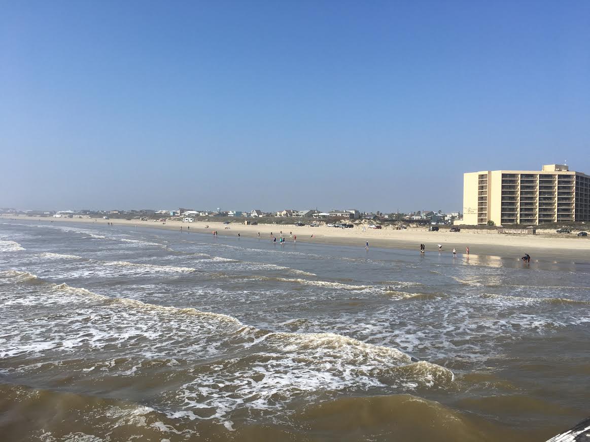 The Horace Caldwell pier at Port Aransas between Mustang Island and San Jose Island is a popular fishing destination. It also has a good view of the beach, and the ships entering and leaving the channel. Photo by Max Rhodes.