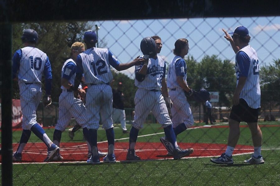 Shortstop Eric Worden is congratulated after his three-run homer in the fifth inning brought the Knights to within two runs at 5-3. Photo by Joseph Cardenas.