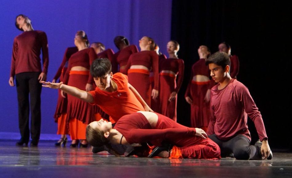 Freshman
Matthew Vargas,
freshman Georgia Dover,
and sophomore Tosh
Arora perform “Love,”
choreographed by Olivia
Chacon. Each year the
emerging ensemble
work with Chacon to
learn Flamenco. “It was a
completely different dance
for me,” Dover said. “The
dance was really emotional
so I got to show a lot of
how I was feeling.”
Photo by Dave Winter.