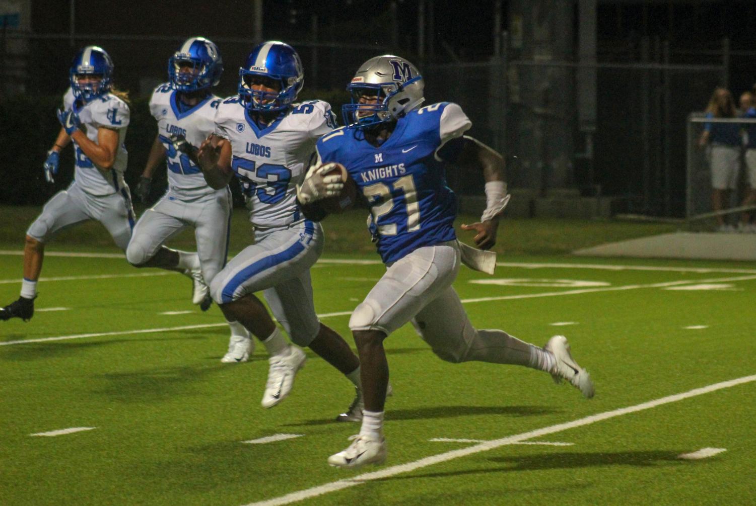 Jalen Sutton ran for 252 yards and three touchdowns from scrimmage and ran back a kickoff 88 yards for another touchdown on the games opening play. Photo by Annabel Winter.