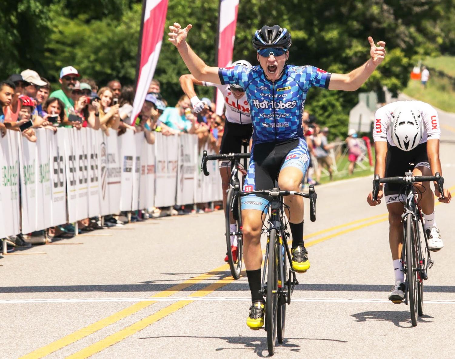 Eli Husted crosses the finish line at the Amateur Road National Championship in first place. The race came down to the end before Husted pushed ahead in the final meters. “I proved that I’d worked harder than they had, and they were more tired,” Husted said. “I knew I could get them at the line, so I just brought them there.”
