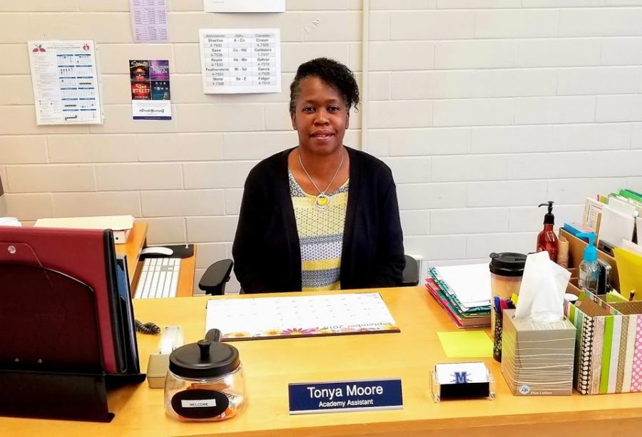New Fine Arts Academy assistant Tonya Moore sits at her desk in the Fine Arts Office in the 600 hall. Moore has spent the last decade helping students stay on track academically and socially.
