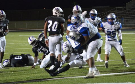 Alvino Carbajal has carried a huge load all season as he did in the LBJ game when he literally helped Deron Gage into the end zone for a touchdown. Both Carbajal and Gage have helped the team on offense and on defense this year. Photo by Dave Winter.