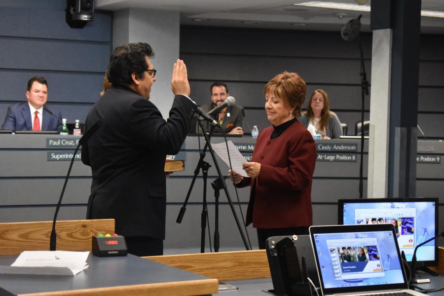Austin ISD Board of Trustees President Geronimo Rodriguez, who was reelected to represent District 6 is sworn for the second time. Photo by Olivia Watts.