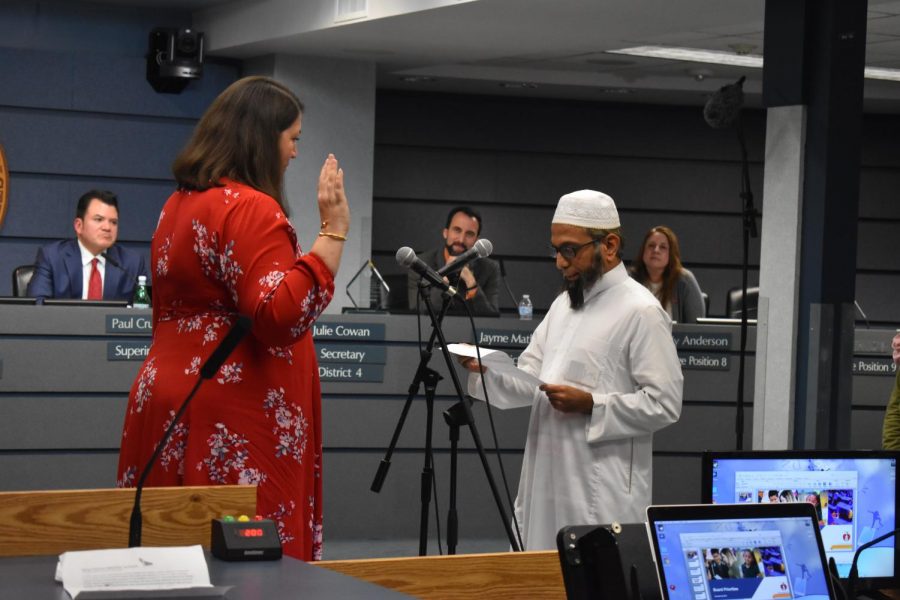 Yasmin Wagner, Austin ISD Board of Trustees Vice President who was recently reelected is sworn in by a Sikh from a local mosque. Photo by Olivia Watts.