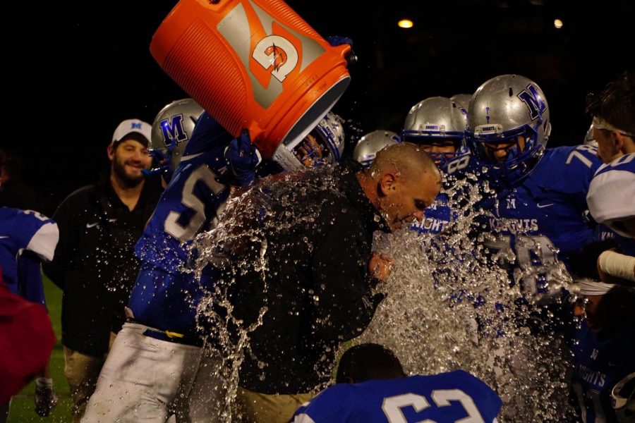 Coach G got a Gatorade shower following the Knights decisive win over Crockett in a game that all but punched the Knights ticket to the playoffs.