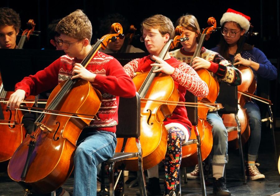 CHARMING CELLOS: During the Winter 2018 McCallum Orchestra Concert, the Chamber (advanced) Orchestra performs one of their christmas pieces. First chair cello, Max Darlington (front left) states that “We’re all wearing christmas sweaters and jeans, so it’s a lot more casual compared to other concerts,” Darlington said. 
