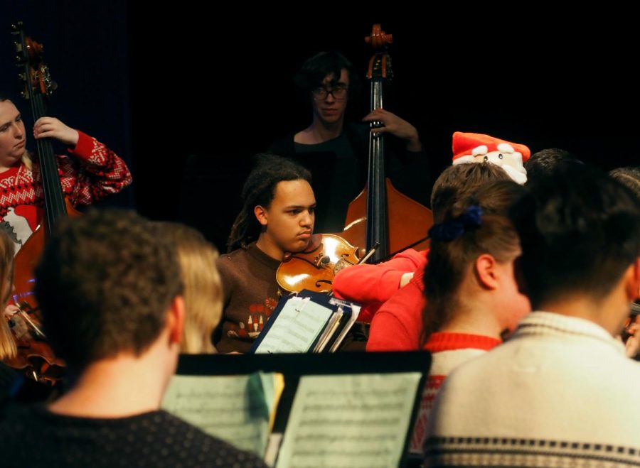 VICIOUS VIOLAS: The viola section picks up the melody during the McCallum Orchestra’s winter performance, with Danali Jah, very concentrated on his part. The concert featured classical pieces as well as holiday favorites arranged by McCallum’s own Mr. Pringle and Mrs. Shockley. “Being in orchestra is stressful and a lot of work;” says Danali “but fun and worth it for the final product.”