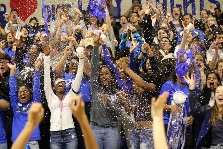 Madison Olsen, Excellent, Student Life Photo. MAKING IT RAIN ON THE RAIDERS: At the
homecoming pep rally on Nov. 10, the senior
section generates the defeaning volume
that would soon win the coveted Spirit Stick
for their class. At the conclusion of the pep
rally, students showered the class of 2018
with cups of glitter and confetti. “I support
my school in everything that I can,” senior
Charliee Arnold said. “It was so much fun to
get to throw confetti and show school spirit
with my senior class, until we had to clean it
all up.” 