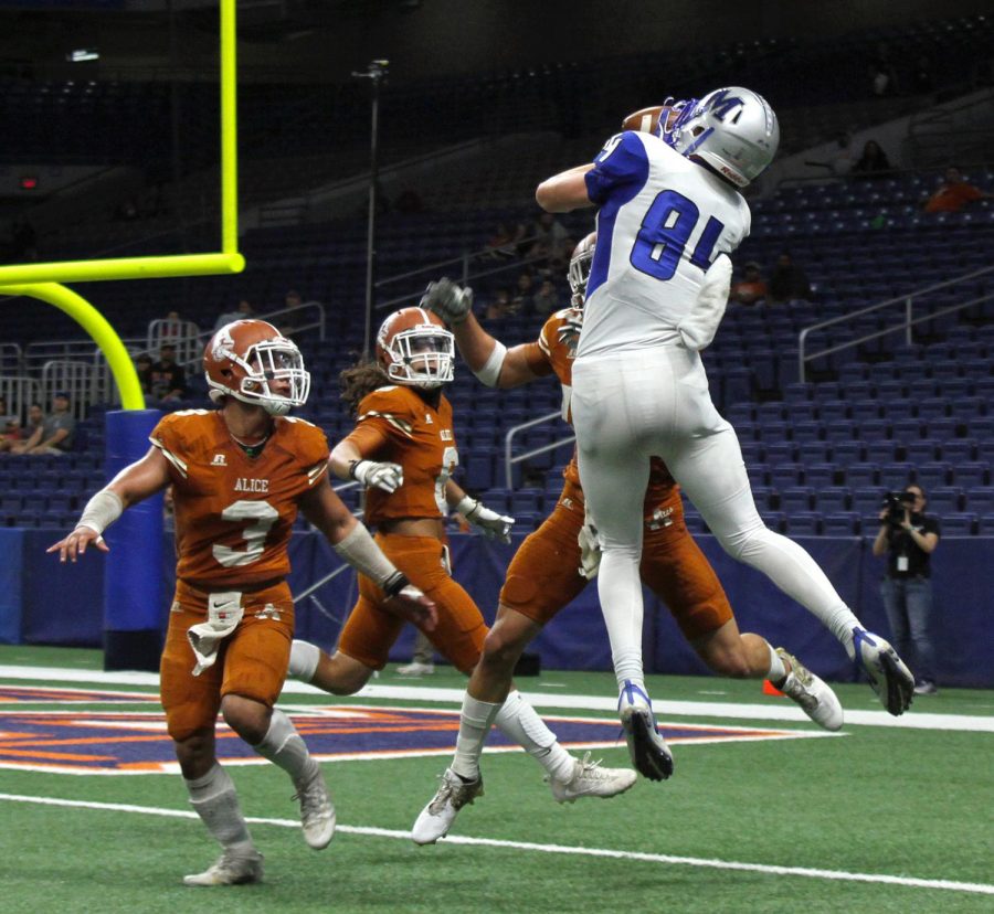 Ian Clennan, Honorable Mention, Sports Action Photo. MASON MAKING HISTORY: After the Knight defense held tough and stopped an Alice drive, senior Mason Bryant stuns the stadium with a half-ending Hail Mary catch that gave the Knights a 14-8 lead. The Knights rolled from there, defeating Alice, 33-8, at the Alamodome on Dec. 2. The victory avenged a 51-year-old loss to ALice, which ended the 1966 Knights season at 11-1. Photo by Ian Clennan.