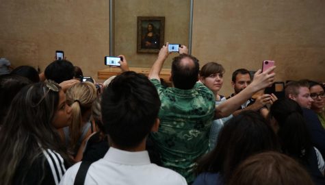 Perhaps when at the Louvre you should look at the Mona Lisa with your own eyes instead of through the lens of your SmartPhone. Just a thought. 