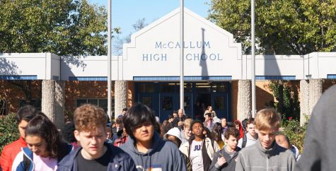 On Nov. 14, McCallum students evacuate the school during a first-period  monthly fire drill. Though we prepare for disasters during first period, we don’t practice evacuating during any other class period, except for fifth period once. As a result, we are only familiar with the routes and procedures we would need to follow during first period.  Photo by Sarah Slaten. 