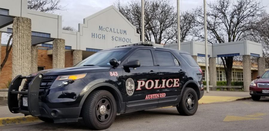 An+AISD+police+car+was+parked+outside+of+the+front+entrance+of+McCallum+on+Feb.+14+after+terroristic+threats+from+the+previous+days.+AISD+police+sent+extra+officers+to+campus+on+Valentines+Day+out+of+an+abundance+of+caution%2C+Garrison+said.