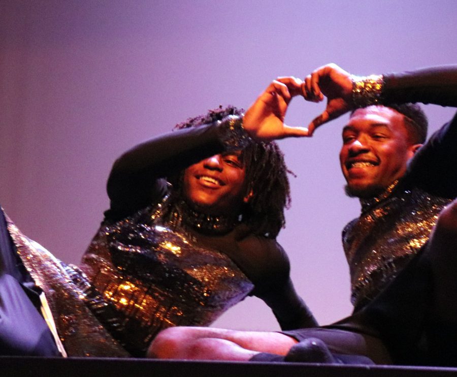 Gabe Williams and Deron Gage wear sparkling costumes as they perform a dance to Sias Chandelier.