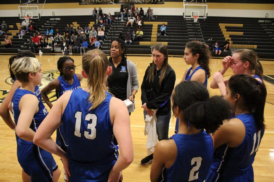 Coach+Campbell+rallies+the+troops+during+a+timeout+at+Lanier%2C+Photo+by+Selena+De+Jesus.