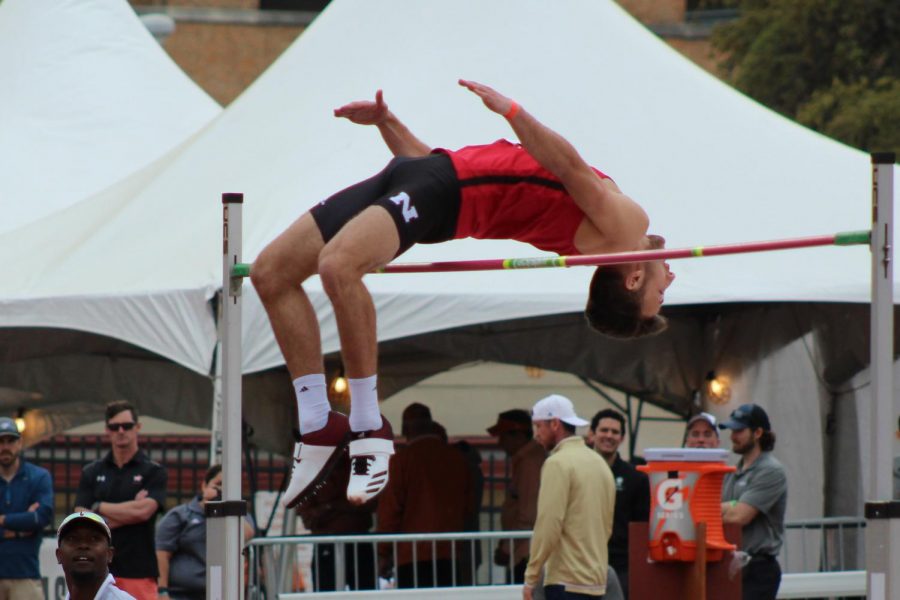 The Texas Relays hosted athletes from several different high schools, colleges, and national level teams. During the college mens high jump, an athlete from Nebraska University clears the pole and moves on to the next height. 