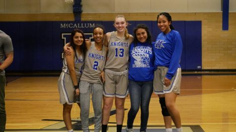 Maddy poses with the other varsity seniors on Senior Night against Lanier in the Don Caldwell Gymnasium on Feb. 5. Photo by Selena De Jesus.
