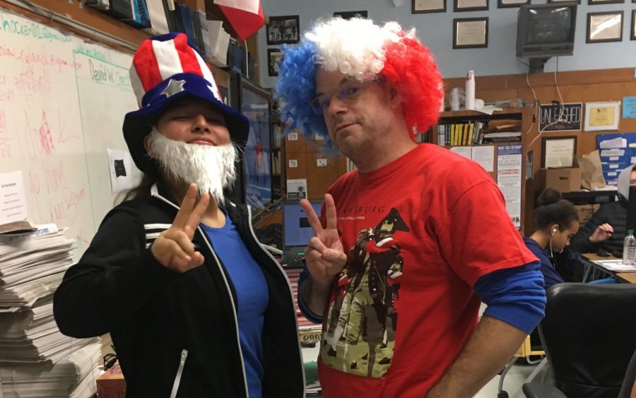 In a rare moment in front of the camera, freshman Selena De Jesus dons  the Uncle Sam gear to celebrate Amercia Day with photojournalism teacher Dave Winter. Photo by Anna Bausman.