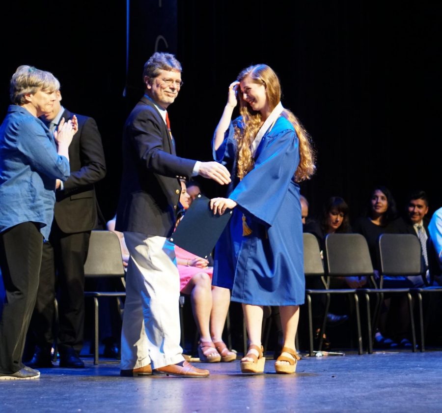 ALL+IN+THE+FAMILY%3A+At+Fine+Arts+Academy+Class+of+2019+Convocation+on+May+23+in+the+MAC%2C+senior+Claire+Rudy+receives+her+Fine+Arts+Academy+medallion+from+her+dad%2C+associate+band+director+Jeff+Rudy.
