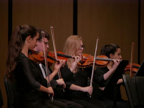 Kaya Fagerstrom, shown here performing at the fall guitar and orchestra concert on Oct. 25 at the AISD PAC, was one of two Mac orchestra musicians to be named on outstanding performer on trumpet. "I think just using my instrument in a lot of different ways is a good skill to have," Fagerstrom told MacJournalism. "I don’t know career wise if that’ll play into what I end up doing, but I do think it could broaden the scope of my horizon as far as job opportunities if I can play more than just raw classical.”
 