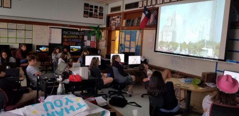 Students in Mr. Winters third-period photojournalism class watch the 2011 documentary, Boatlift, which features first-hand accounts of the heroic effort of ordinary boat operators to rescue nearly half a million stranded New Yorkers in southern Manhattan in the wake of the 9/11 attacks on the World Trade Center.