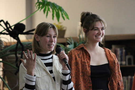 During the 2018 Coffee House, then junior Sophie Knifton (now one of the Excalibur directors) and then sophomore Kaia Boyle 
introduce the next set of performers