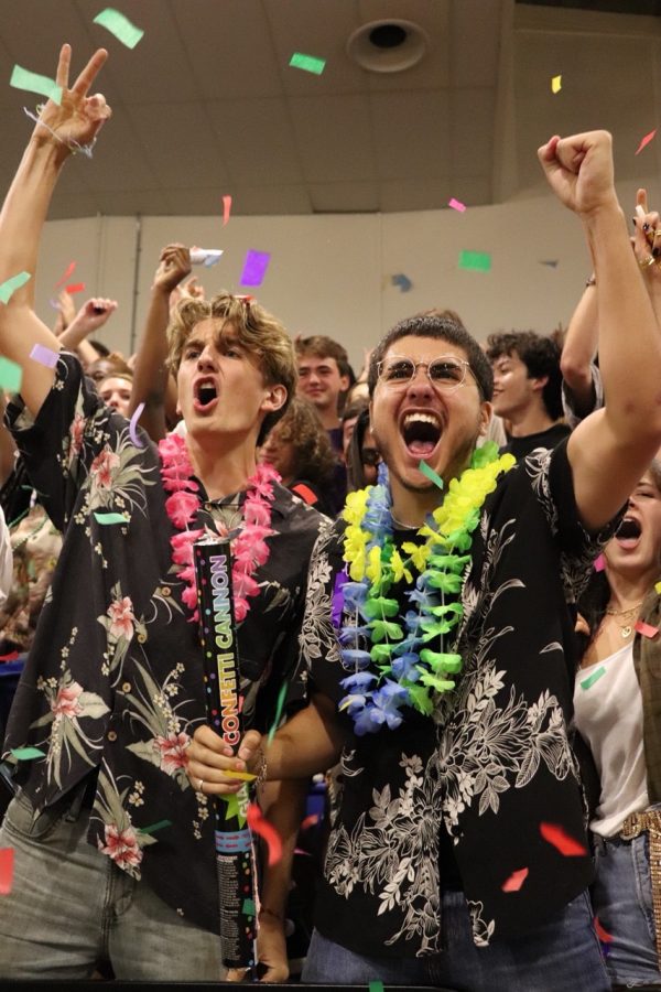 Seniors Riley Edwards and Bryn Lewis show their 2020 spirit after the senior class won the spirit stick at pep rally commemorating a rivalry game named after ... a certain chain restaurant in town. Photo by Gabby Sherwood.
