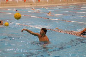 PRINCE OF POLO: Senior Cole Kershner warms up during a water polo practice.  “It takes a lot of stamina because you’re constantly sprinting back and forth, but I have pretty good stamina,”  Kershner said.
Photo by Gabby Sherwood.
