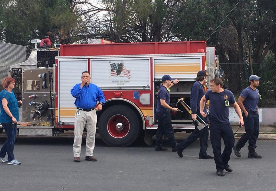 Austin Fire Department personnel arrive at Mac in response to a fire alarm that went off inside the school during lunch today. 