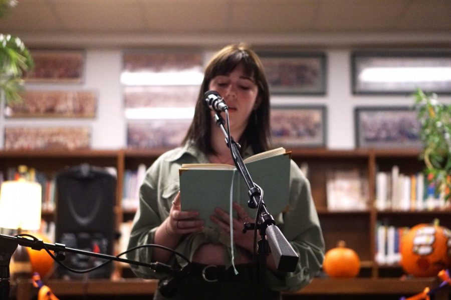 Ivy Jane Golyzniak performs her spoken word poetry at the annual Coffee House hosted by Excalibur. Photo by Ellen Fox.