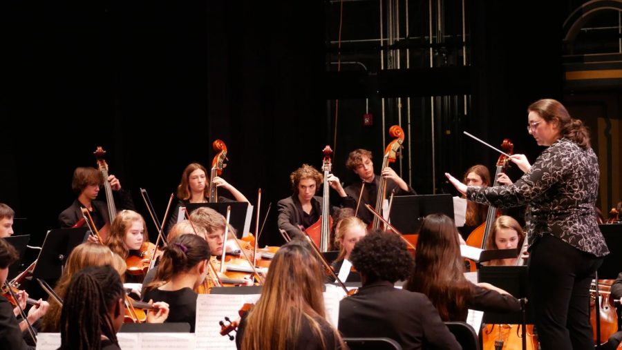 Elder directs the non-varsity orchestra during its pre-UIL concert in the MAC on Feb. 11. Photo by Steven Anzures.