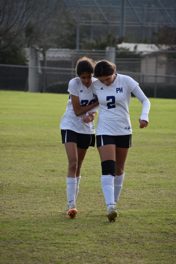 AN UNSETTLED SCORE: The JV girls soccer teams from Anderson and McCallum have now played twice, a scrimmage in December and a tournament game on Saturday morning, and they still havent settled the score between friendly neighborhood rivals. In fact, neither team has scored … period. For the second time, the two teams left the pitch scoreless when the teams shut each other out on a chilly day at Noack Field 1. Sydney Wallace appeared to break the deadlock with a goal midway through the second half, but the goal was disallowed because of an offsides call. Freshman midfielder Tallulah Wilson said that the game was evenly matched but that the Knights pressed the attack in the second half. Sophomore forward Anna Bausman said, “We had a lot of opportunities but couldnt finish them.” The draw was the team’s second of the JV tournament at Noack. The Knights won their third game, 5-0, over Travis, played Saturday afternoon at McCallum. Photos by Esme Moreno Bernacki