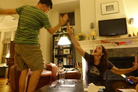 GAME NIGHT: Being stuck at home has definitely made our family push each others buttons more than usual, but we also have been able to make room for quality family time. Playing games always brings out the goofy side of the family, a side I love to see. Photo by Camille Wilson.