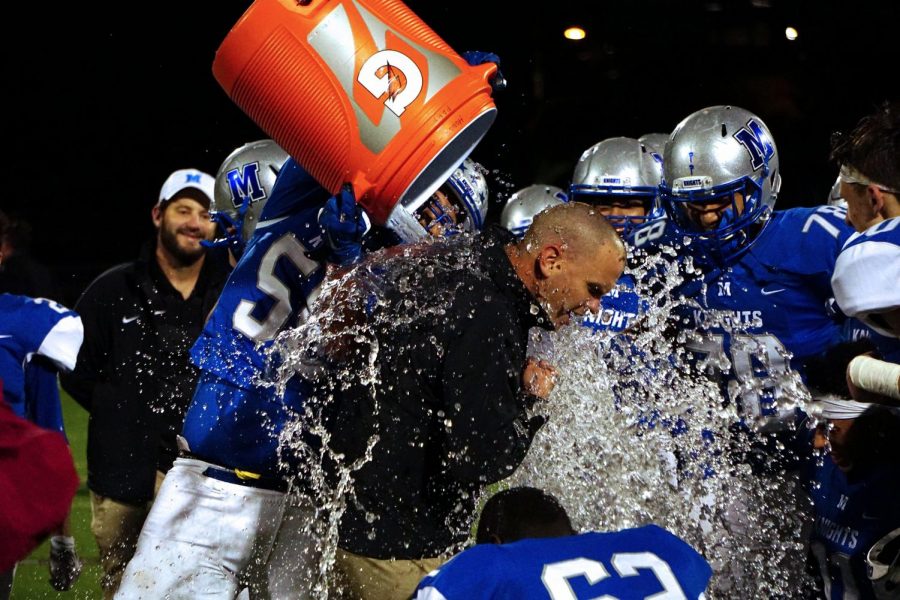 Caleb Melville won first place in the yearbook sport feature photo category of the 2020 Columbia Scholastic Press Association Gold Circle Award competition. In the photo, Coach G gets a Gatorade shower following the Knights decisive win over Crockett in a game that all but punched the Knights ticket to the 2018 playoffs. Photo by Caleb Melville.