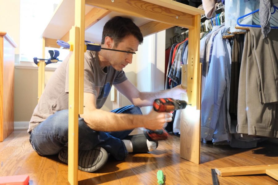 FINDING A PLACE TO WORK: My dads an architect, and since the stay-at-home order, he hasnt been able to go into his office. Because our house is small, he built himself a desk in his room, so he could have his own space to work. Hes always very resourceful, so he was able to build a desk out of an old art table and some pieces of wood he had lying around. Photo by Kate Boyle.