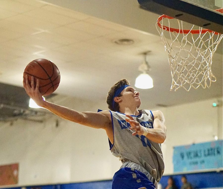 Junior forward Rob Wade spent a lot of time this season above the rim, which is one reason he was named the teams most valuable player. Photo by Kennedy Weatherby.