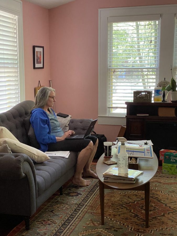 WORKING FROM HOME: My mom has been working a lot on her laptop and doing meetings through zoom all week and she switches up her locations a lot. This is our front room but she switches between the front porch and her room. Photo by Tallulah Wilson.